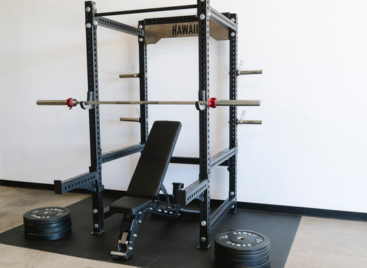 Hawaii power cage with adjustable bench, barbell and bumper plates